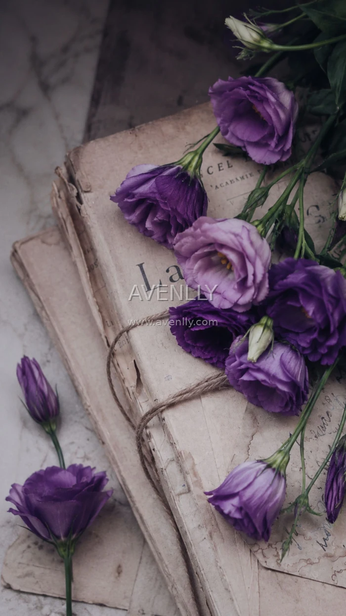 Vintage Book with Purple Flowers Aesthetic Wallpaper